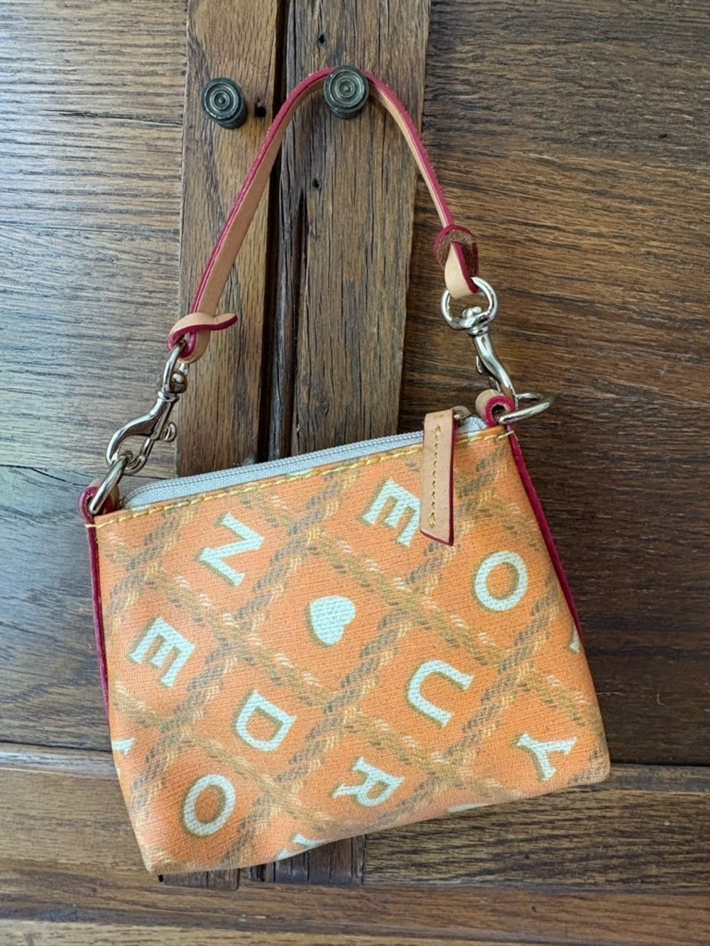 Vintage Dooney & Bourke Wristlet Small Purse Orange Cream Coated Canvas Spellout